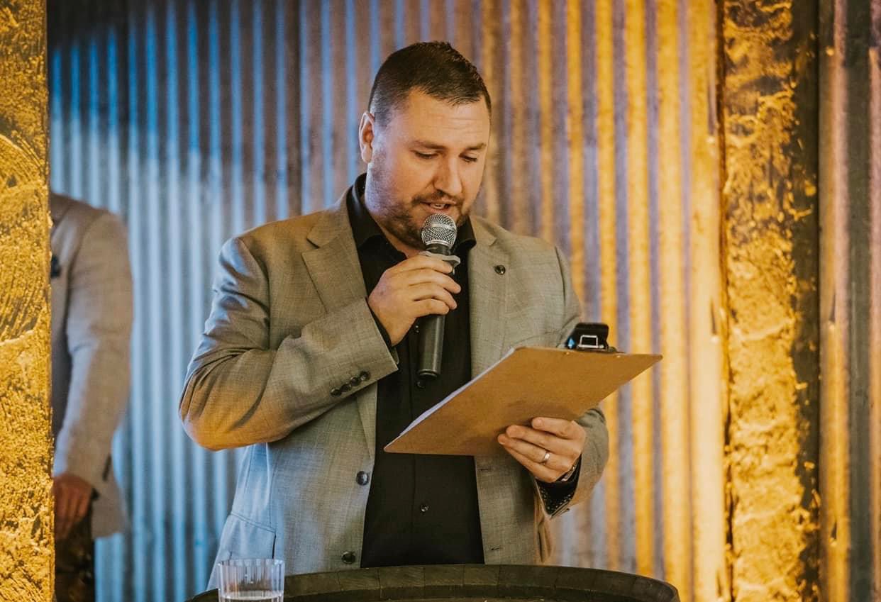 Venue Events wedding MC speaking at a reception in Canberra