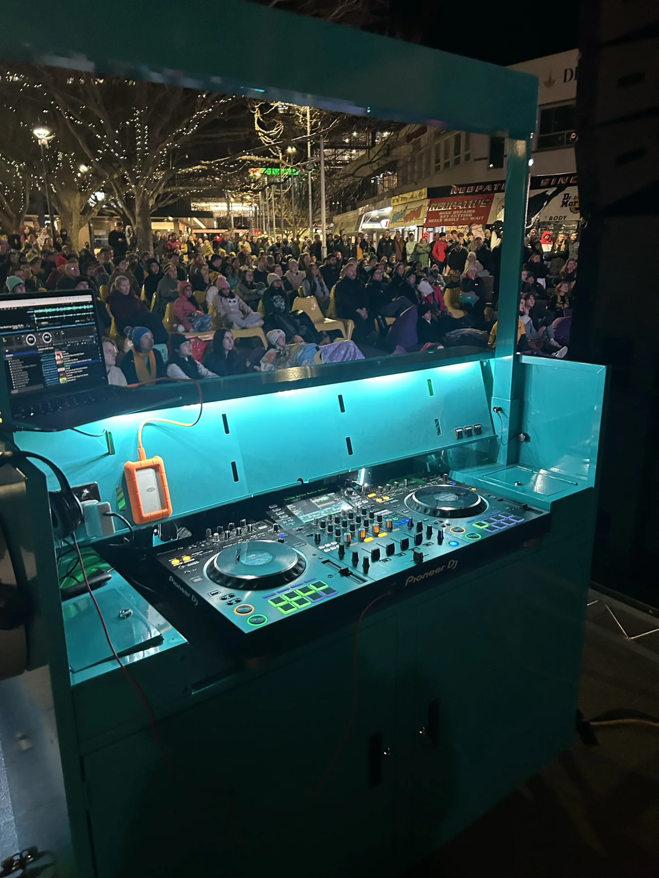 BoomBox being used to entertain a large outdoor crowd